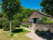 The south elevation with French doors that open from the sitting-room to the terrace.